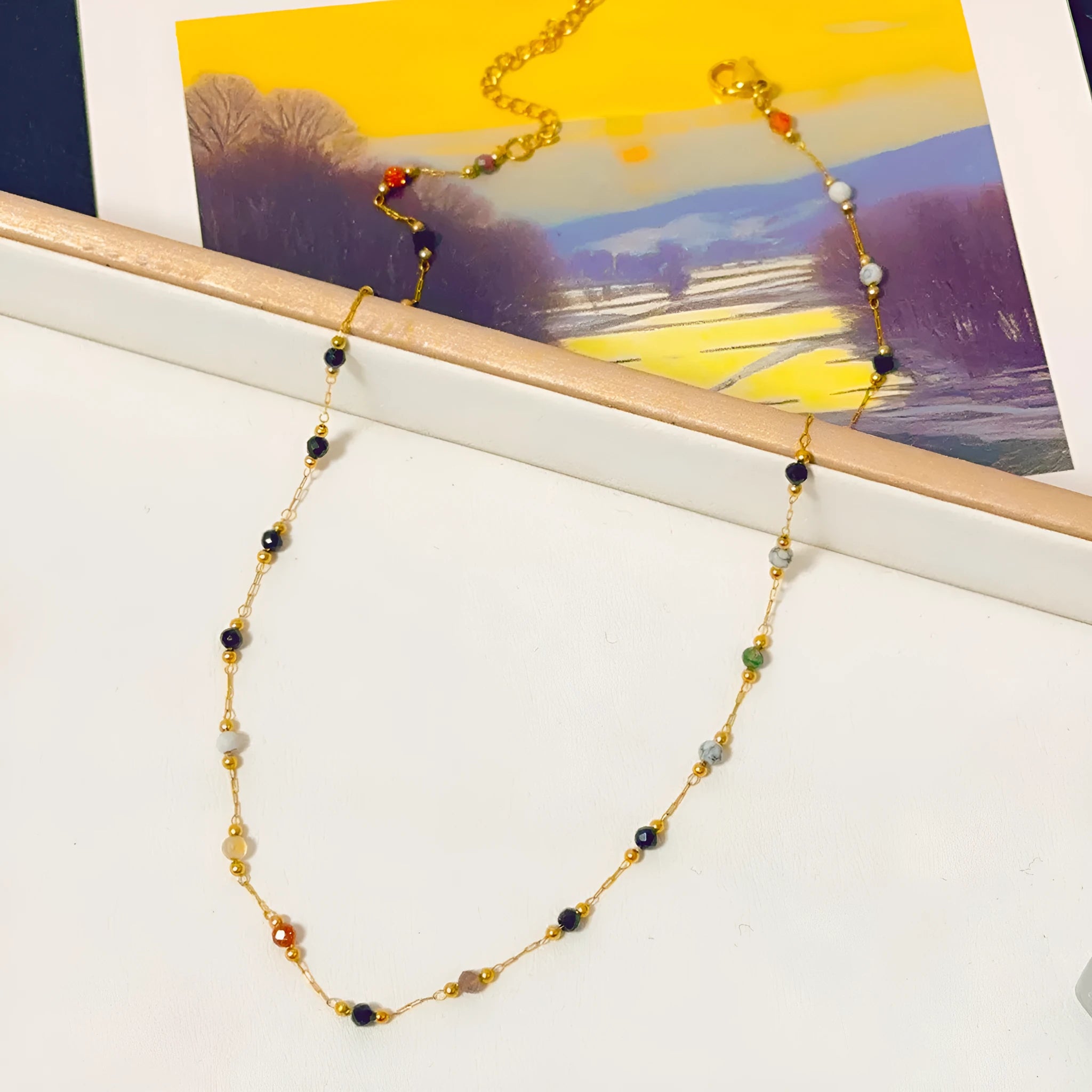 Women's gold titanium steel necklace with pendant on O-ring chain, simple retro design