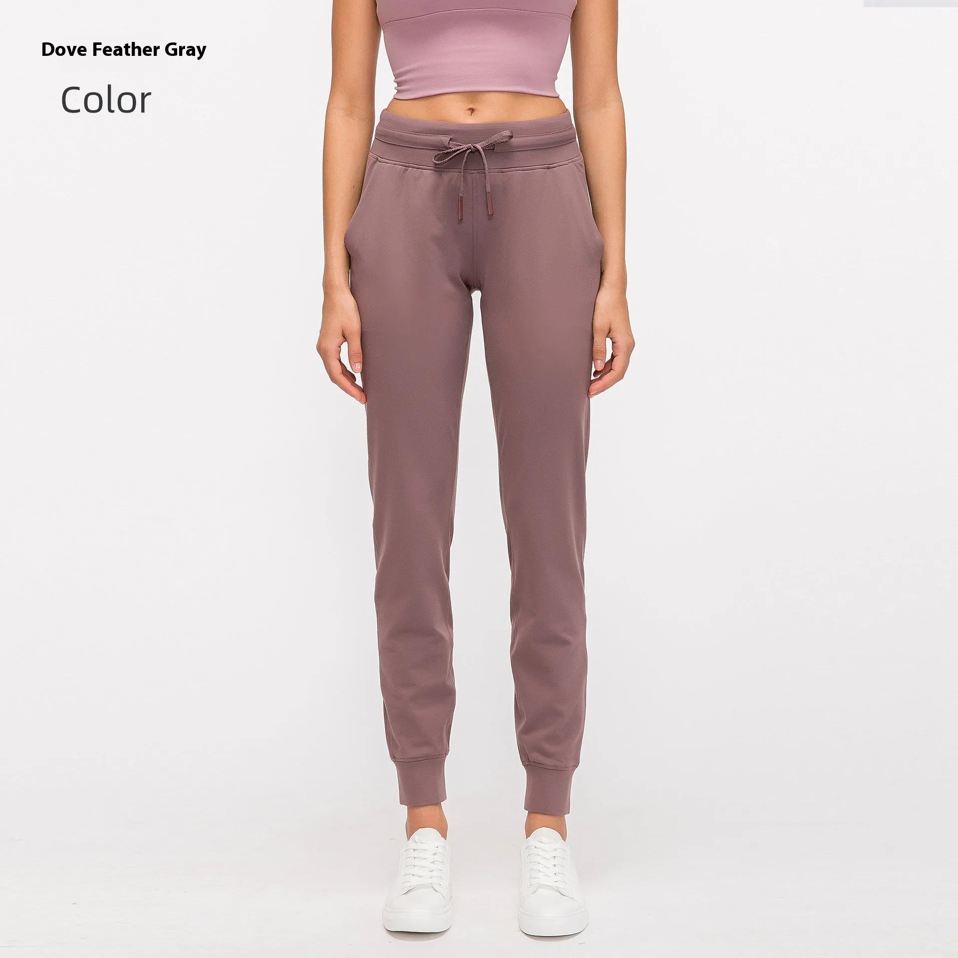 Women's high-waist yoga pants with drawstring waistband in a cotton blend fabric.