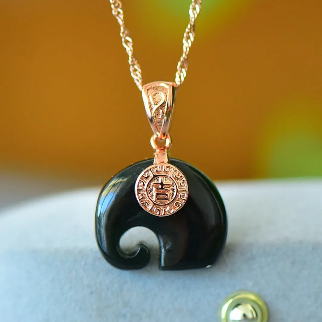 Natural Hetian jade pendant with copper inlay detail on necklace chain