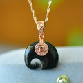 Natural Hetian jade pendant with copper inlay detail on necklace chain