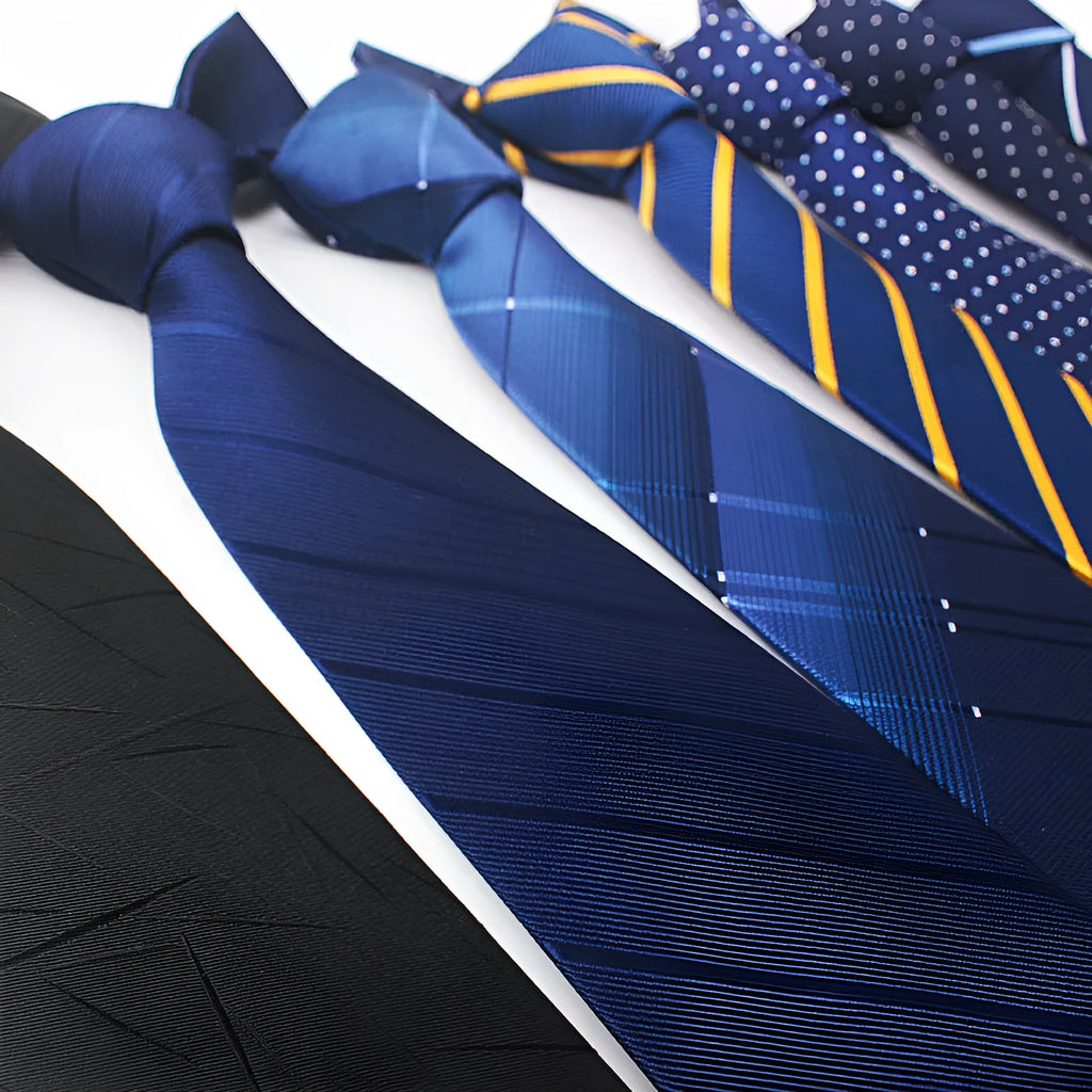 Close-up of a red, black, and blue striped men's formal tie with a textured Jacquard weave.