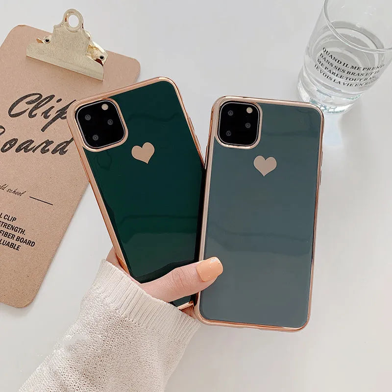 Simple solid colour TPU back cover case for iPhone on a table, shown in blue.
