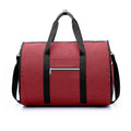 Cylinder-shaped medium travel bag in Oxford cloth, shown in black, blue, light grey, or red colour options.