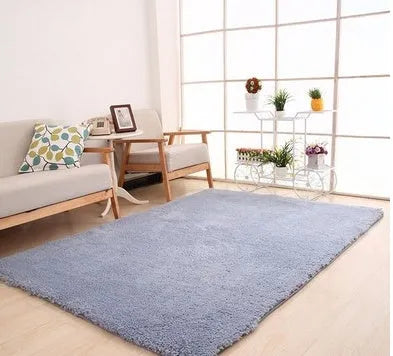 Solid colour fluffy plush rectangle carpet showing soft pile and non-slip dotted bottom.