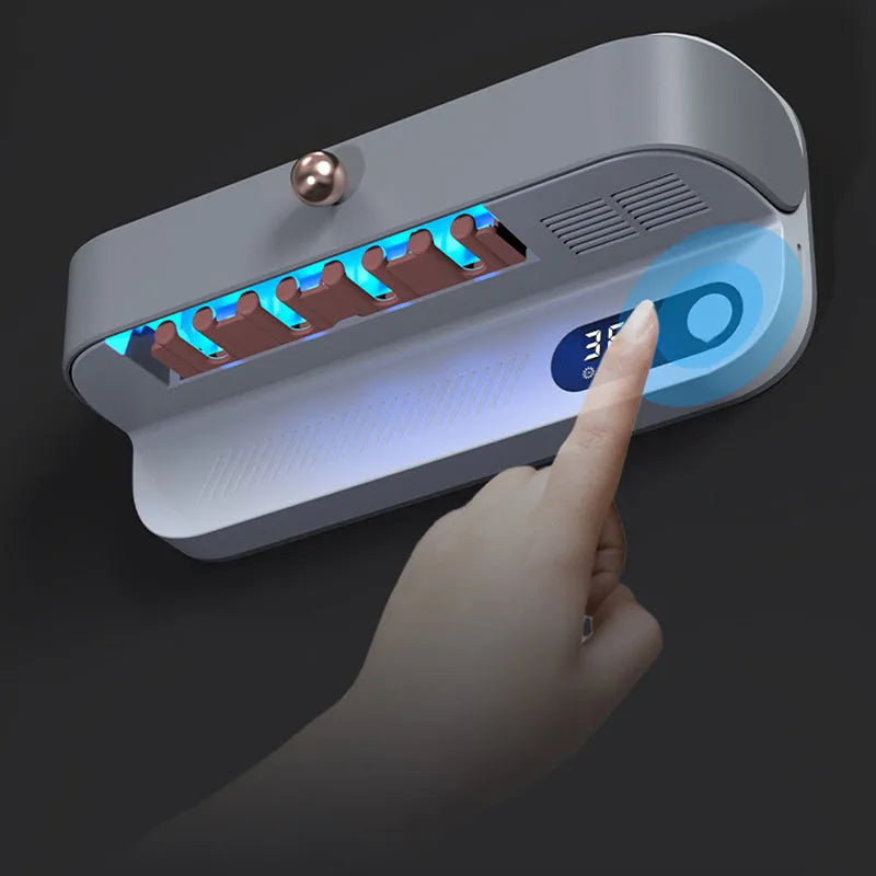 White wall-mounted smart toothbrush sterilizer holder with UV light and USB port.