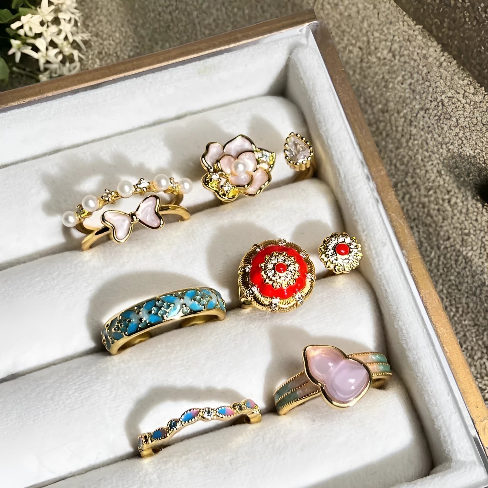 Adjustable copper gourd ring with flower and bow design in New Chinese style featuring inlaid zircon stones