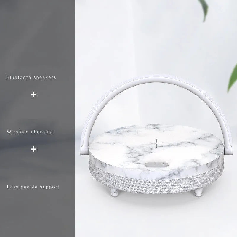Wireless charging LED night light with Bluetooth speaker and phone holder in marble pattern or wood grain finish
