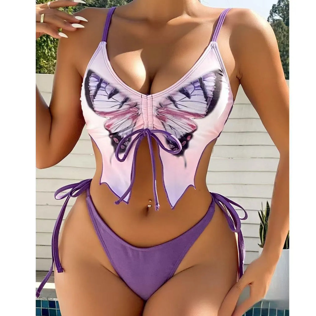 Women's purple split bow back bikini swimsuit set on mannequin, showing sleeveless top and briefs.