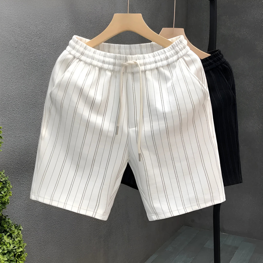 Men's black and white striped casual shorts with a fleece lining and double-layer waistband.