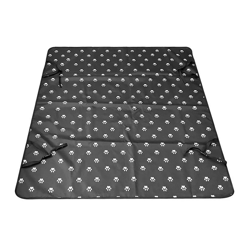 Dog car seat protector mat on rear bench seats in grey dog footprints pattern