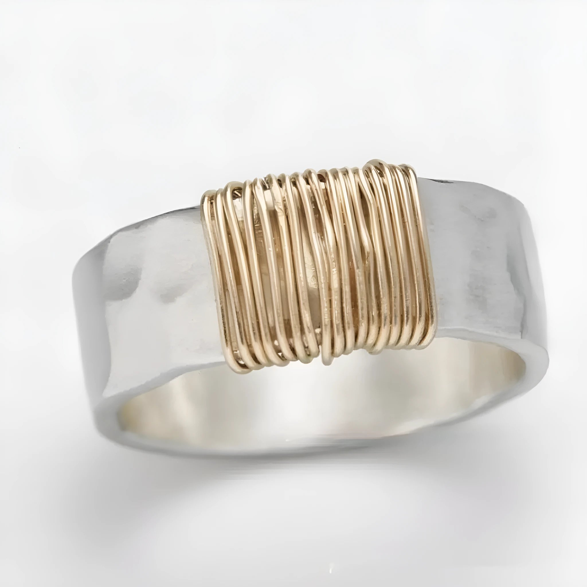 Wide-faced copper geometric bracelet with silver gold electroplated coil finish