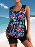 Women's floral printed two-piece swimsuit with sleeveless top and matching shorts in blue or green