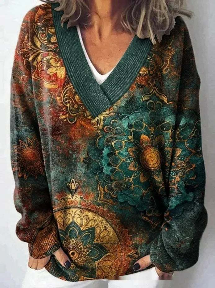 Women's V-neck long sleeve sweatshirt with a blue and white 3D floral print pattern.