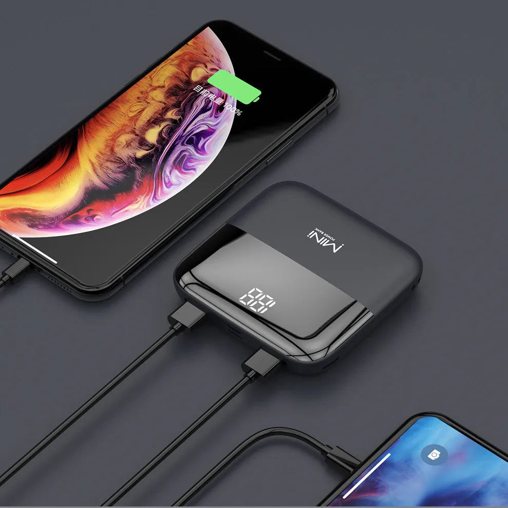 10000mAh portable power bank with digital display showing battery percentage and dual USB ports