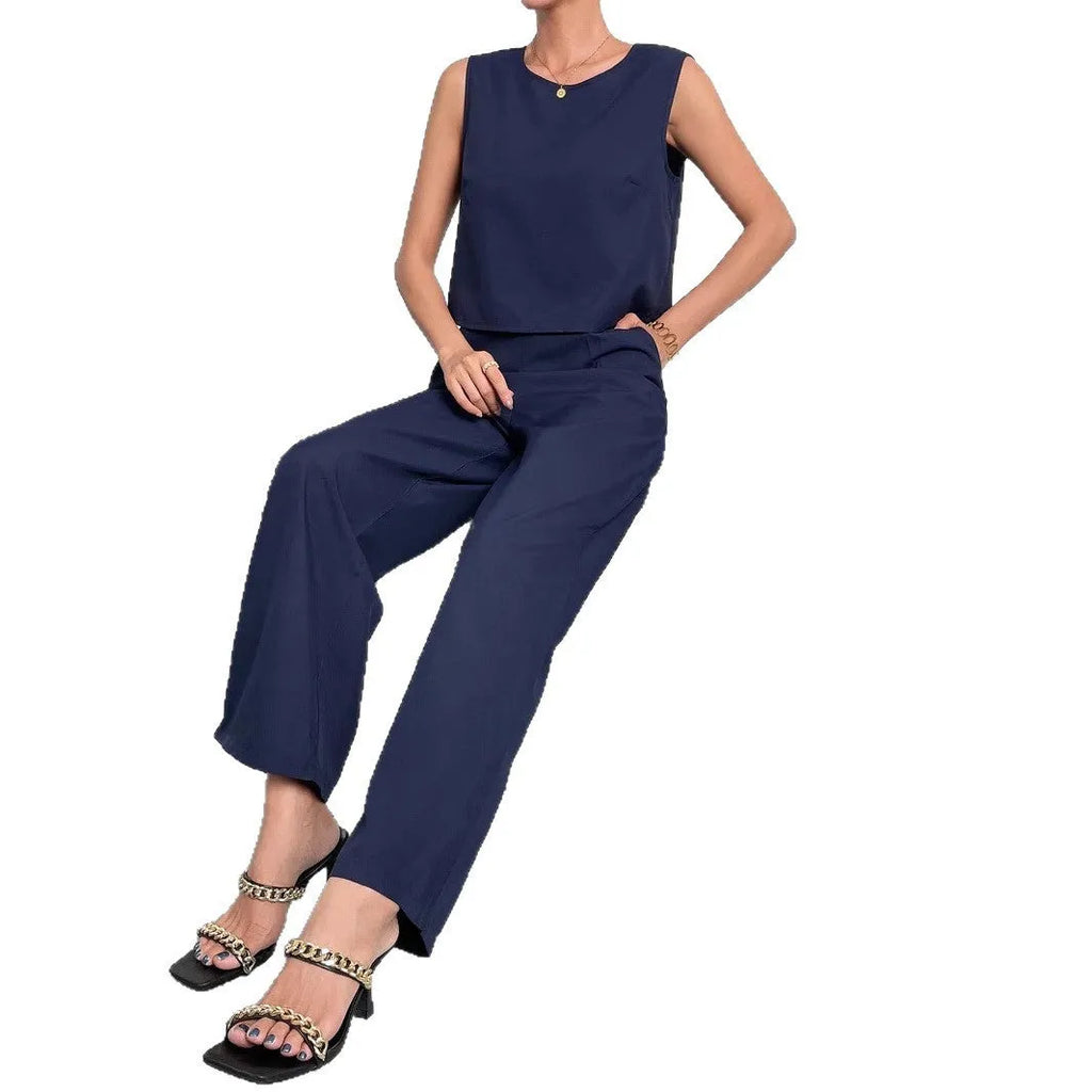 Red sleeveless top and wide leg trousers two-piece set for women on a hanger.