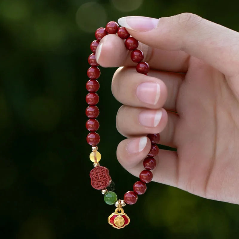 Emperor Sandstone Cinnabar bracelet with Fu character charm, showing 6mm and 8mm bead size options.
