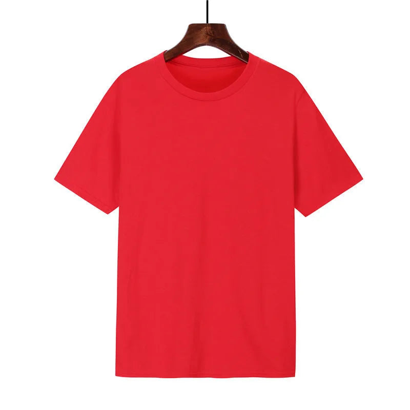 Men's loose-fit cotton t-shirt in black, shown on a model, with short sleeves.