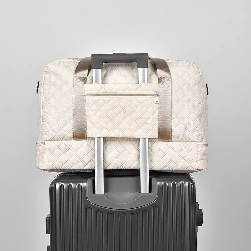 Oxford cloth travel bag with 36-55 litre capacity for leisure trips and buggy use in solid colour options