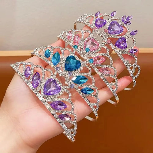 Children's metal alloy crown headdress hairband in pink, light blue, or light purple with crystal decoration.