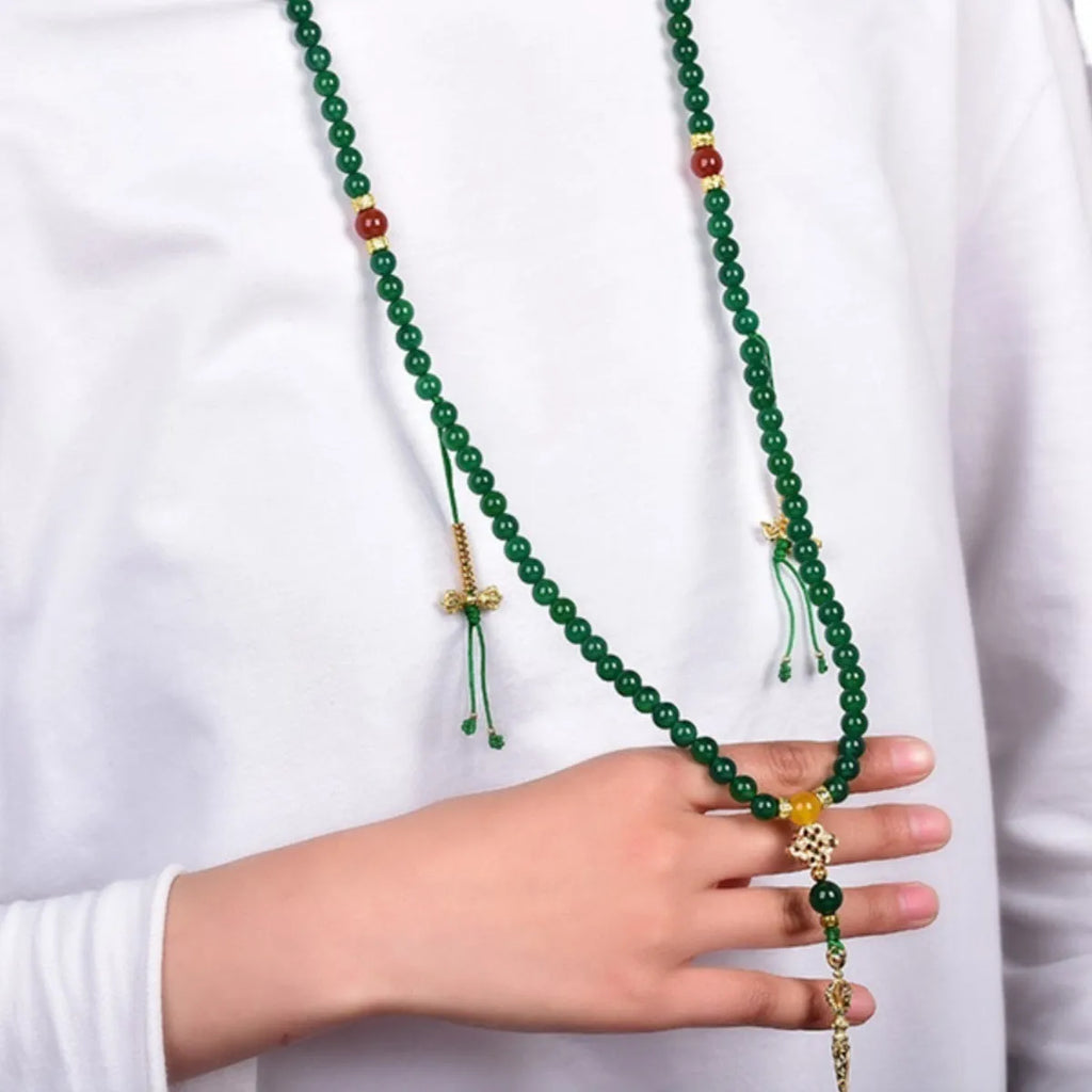 Handmade green agate multi-strand bracelet for men and women on a white background.