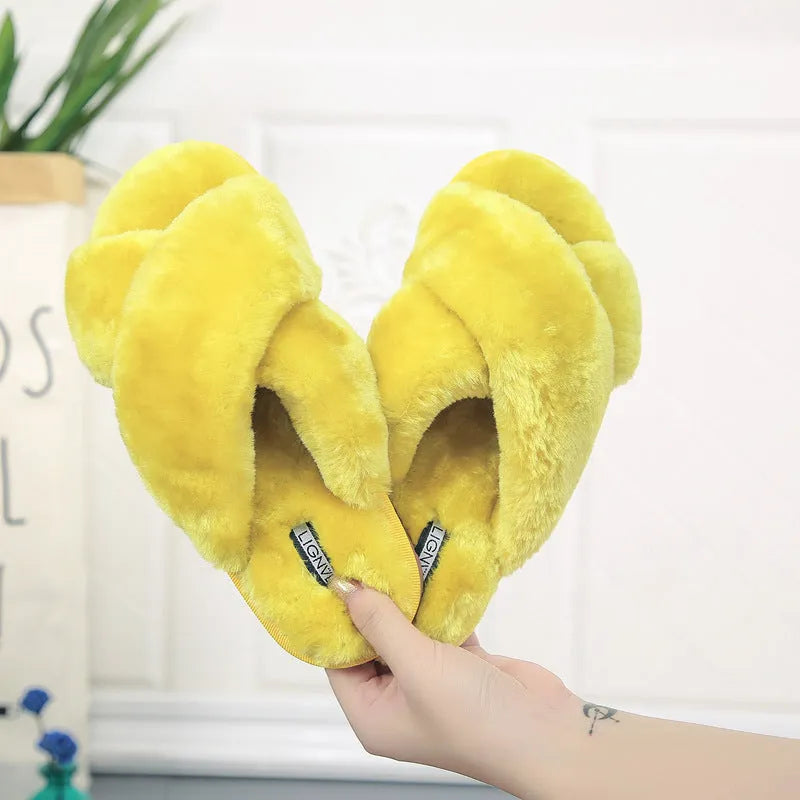 Women's black cross open-toe fur slippers with a patterned anti-slip sole.