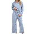 Women's solid colour lapel long sleeve knit jumpsuit with elastic waist trousers in jacquard fabric.