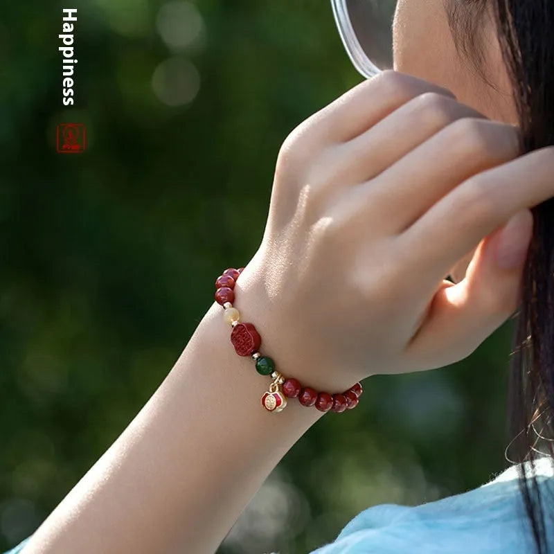 Emperor Sandstone Cinnabar bracelet with Fu character charm, showing 6mm and 8mm bead size options.
