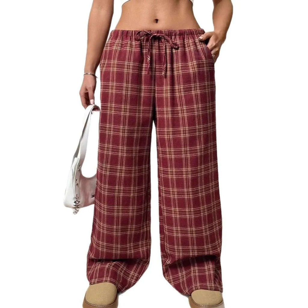 Women's loose fit plaid trousers with drawstring waist and side pockets in red and blue colours