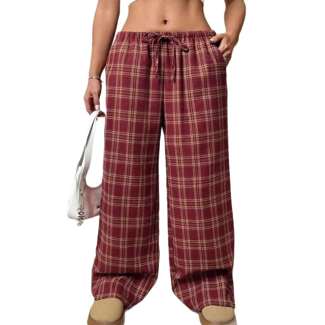 Women's loose fit plaid trousers with drawstring waist and side pockets in red and blue colours