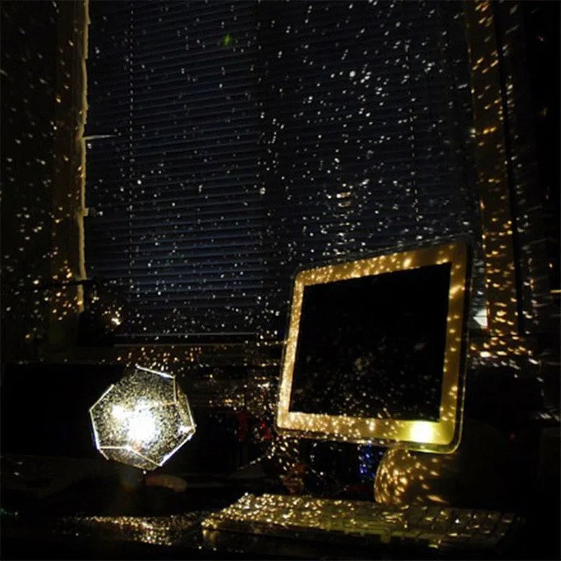 LED starry sky projector night lamp showing constellation projection on a bedroom ceiling.