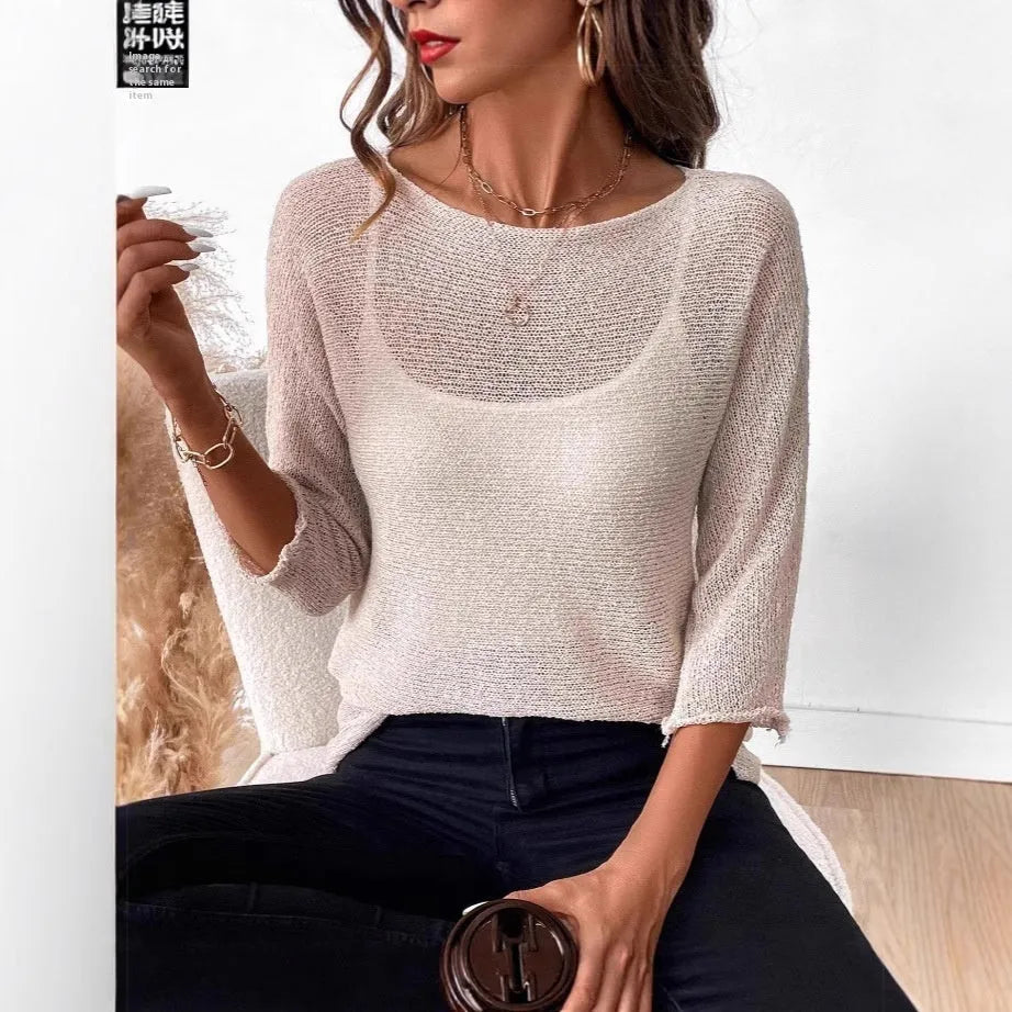 Women's thin knitted off-shoulder top in polyester with a 3D pattern, shown in a light colour.