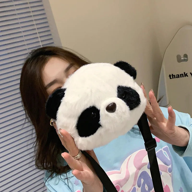 Plush cylindrical crossbody bag with panda design, showing sandwich pocket and shoulder strap