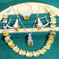 Four-piece bridal jewellery set with necklace, bracelet, earrings, and ring in alloy with zircon detail
