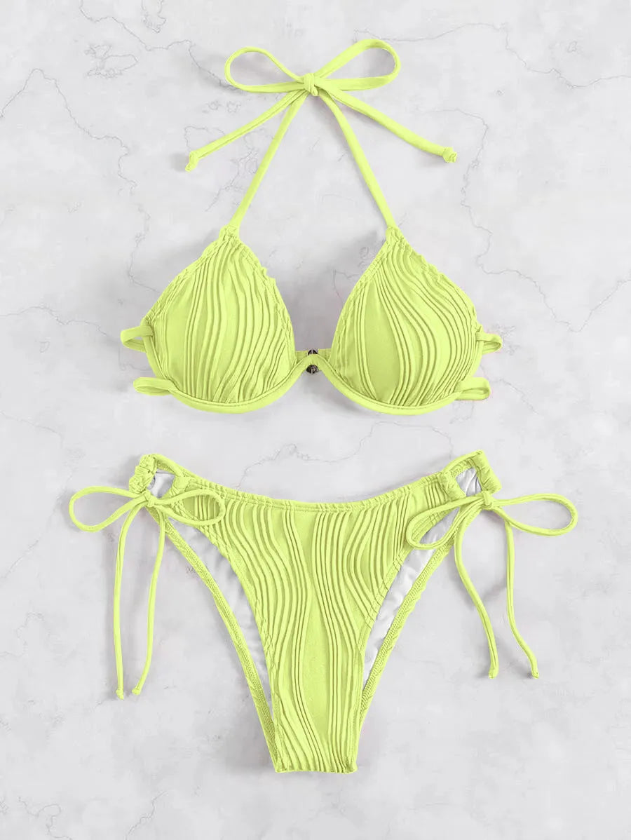 Women's apricot coloured split bikini swimsuit with steel wire bracket support.