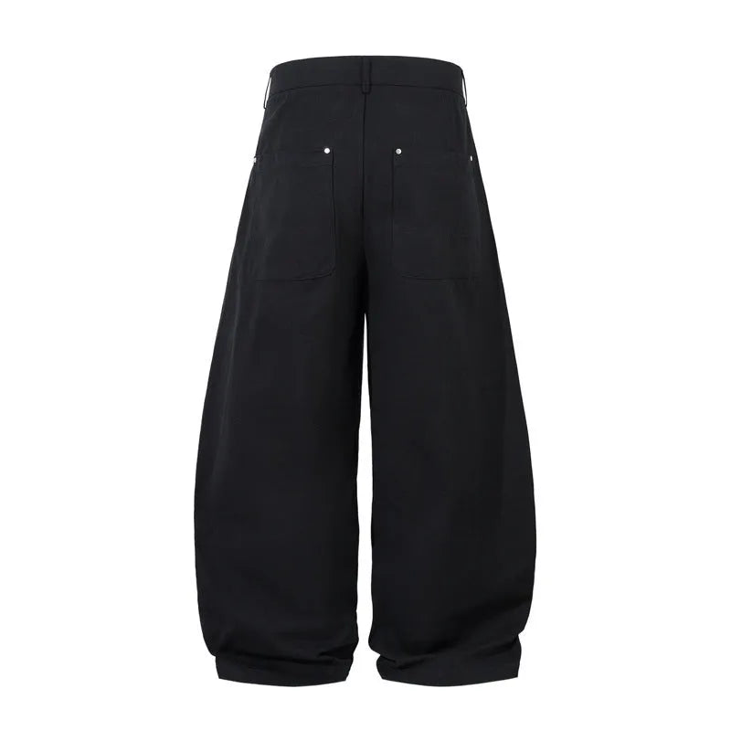 Men's black pleated casual trousers with machete pleats and loose wide-leg fit