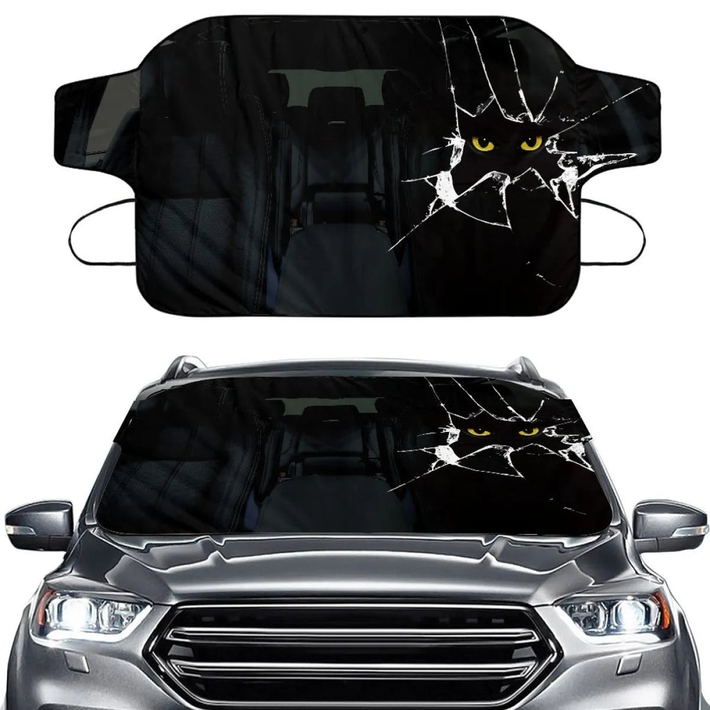 Universal car front snow protection cover made from silver aluminium fabric, shown fitted to a vehicle's windscreen and bonnet.