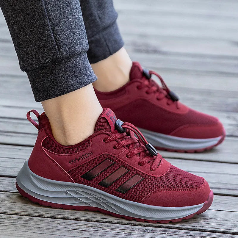 Breathable non-slip casual shoes with mesh upper and elastic band closure in black, dark grey, purple, and purplish red.