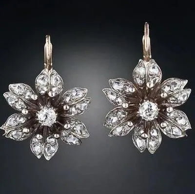 Silver retro fashion earrings for women with creative design and electroplated alloy construction