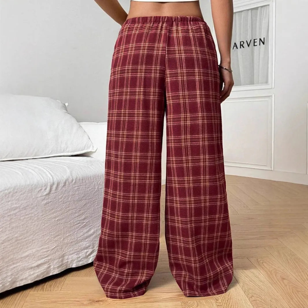 Women's loose fit plaid trousers with drawstring waist and side pockets in red and blue colours