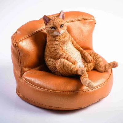 Lazy cat resin car dashboard ornament with sofa, 7.5cm tall