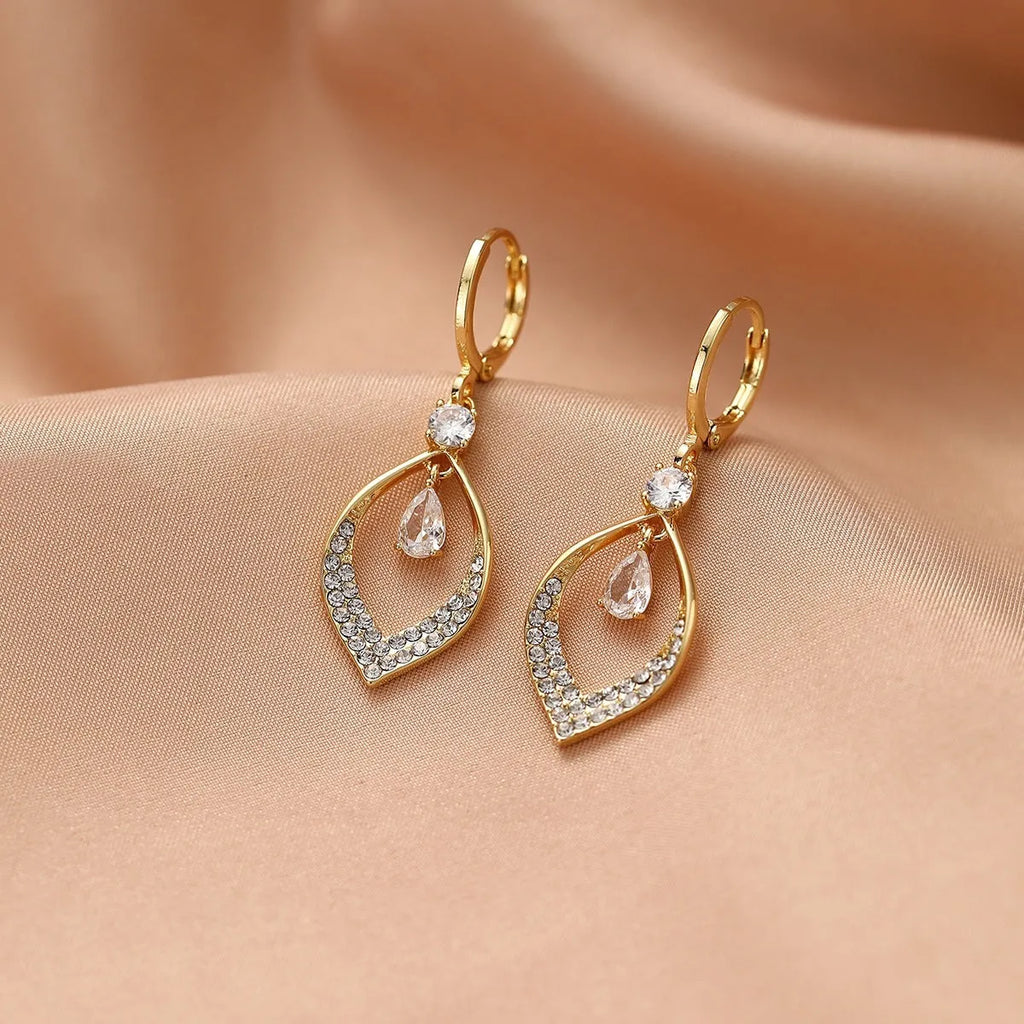 Women's copper zircon water drop tassel dangle earrings with gold or silver ear buckles.