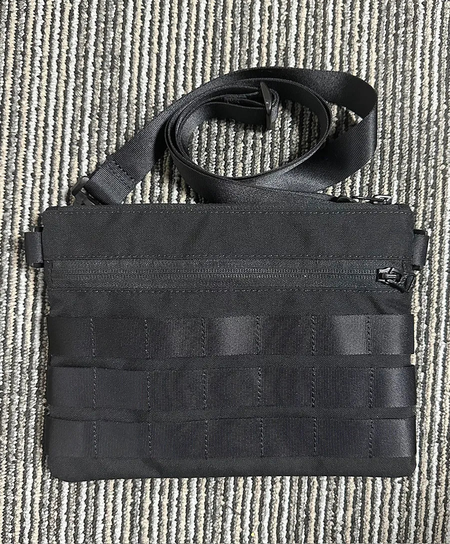 Black Oxford cloth outdoor waist bag showing compact 18 by 3.5 cm size.