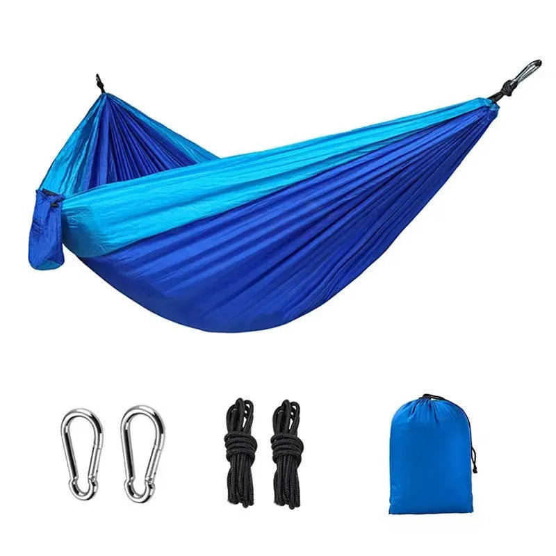 Outdoor nylon hammock in blue colour with reinforced stitching for camping and garden use