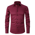 Men's long sleeve stretch work shirt in polyester fabric on a hanger.