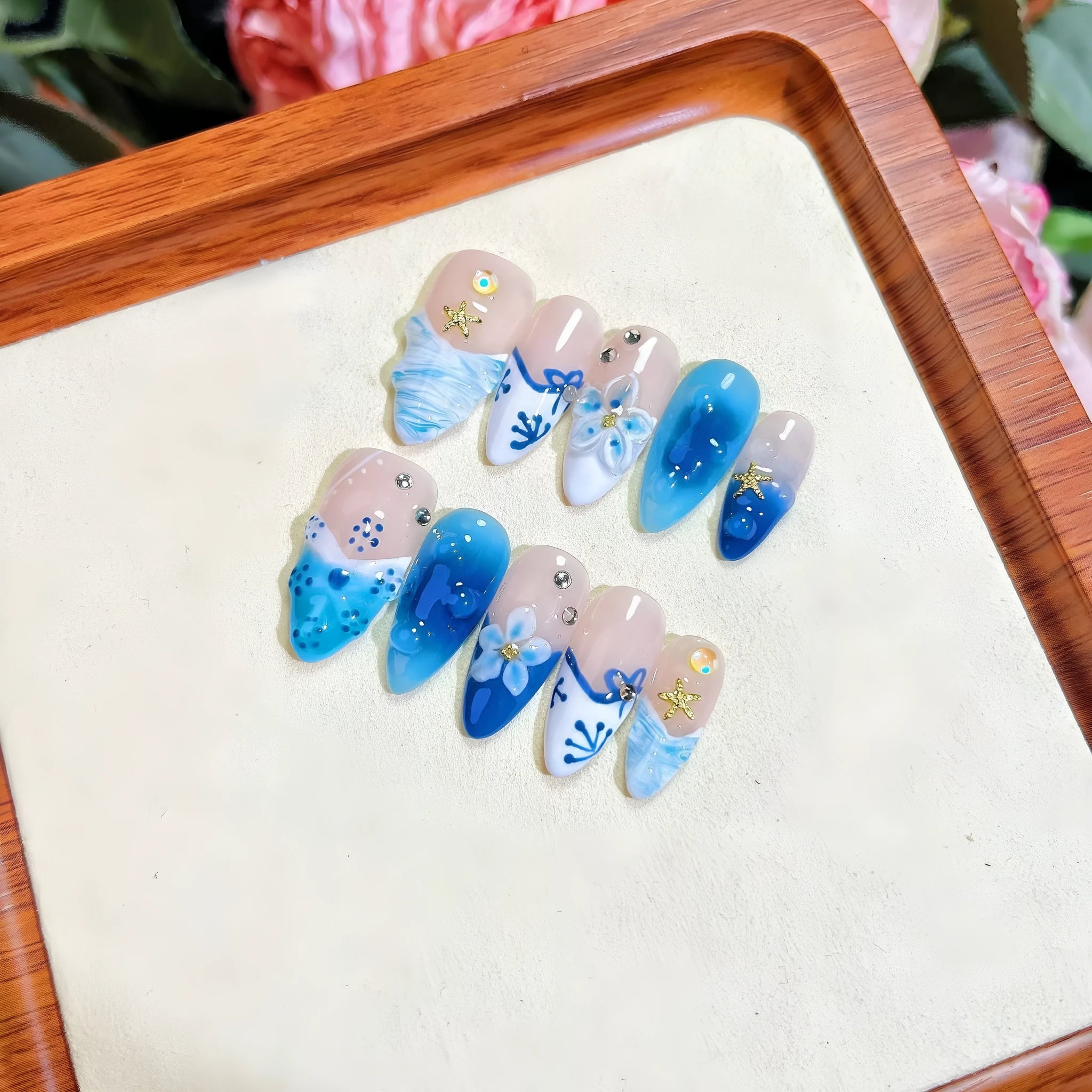 Blue hand-painted carved summer ice transparent plastic fake nails set in sizes XS S M L