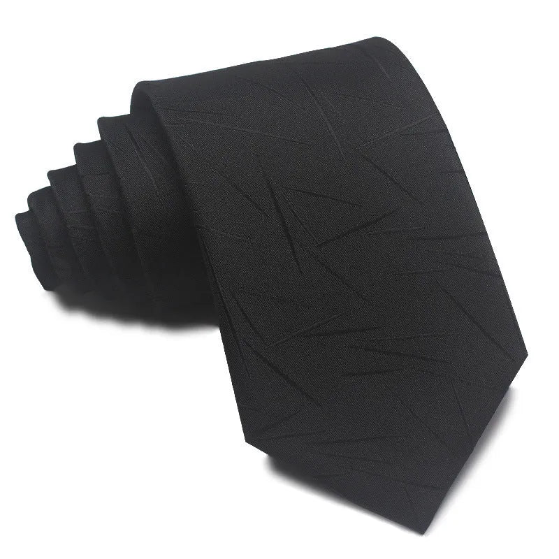 Close-up of a red, black, and blue striped men's formal tie with a textured Jacquard weave.