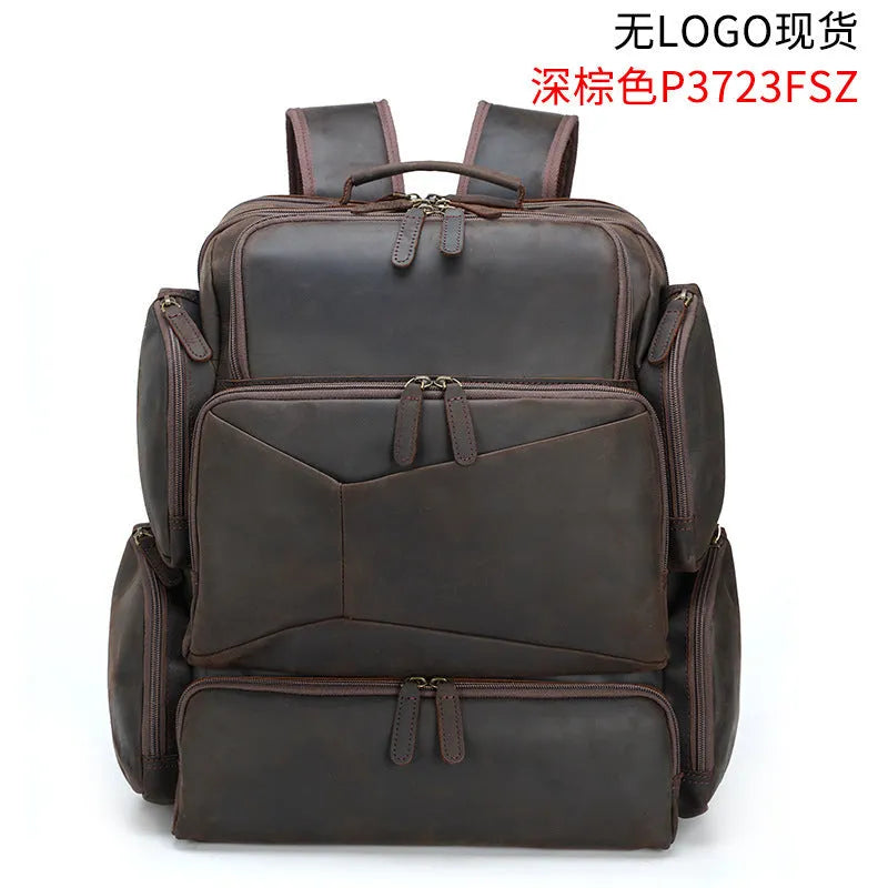 Dark brown genuine leather 17-inch laptop backpack with double shoulder straps and embossed finish