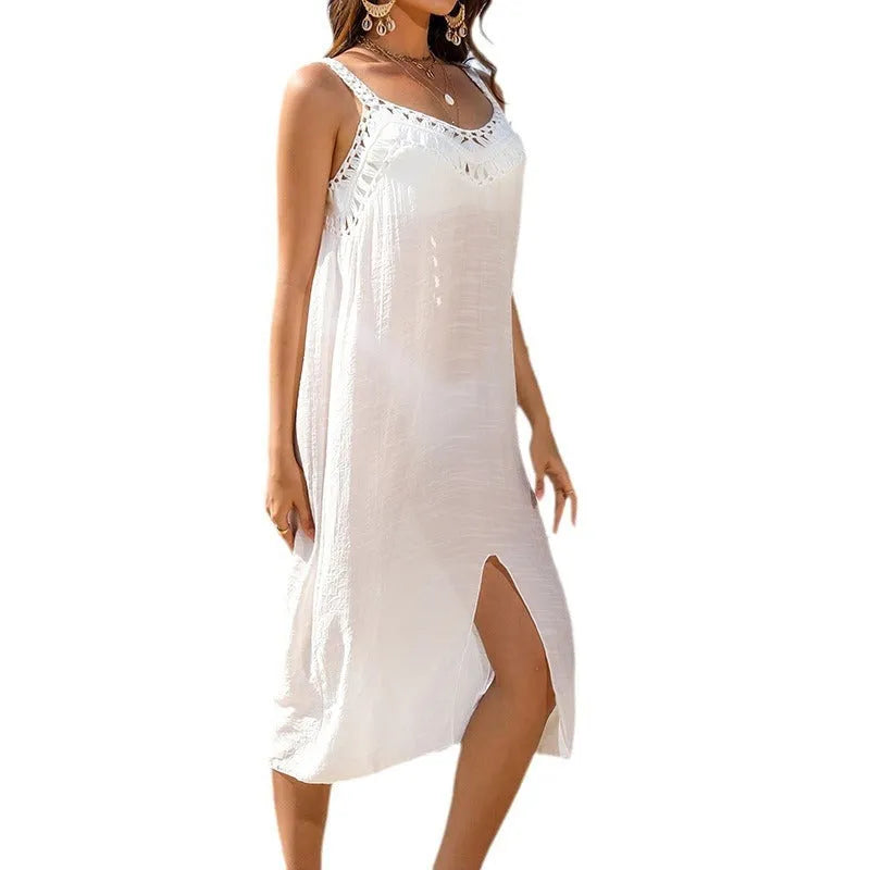 White crochet suspender beach dress with bottom slit on adult female model