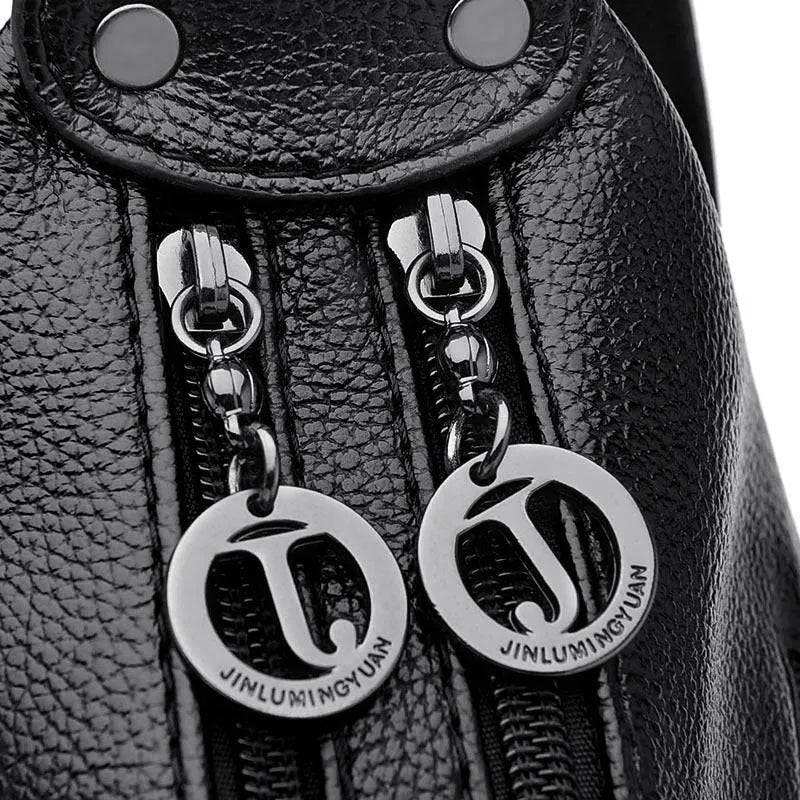 Large black PU shoulder bag with multiple internal compartments showing phone and document sections