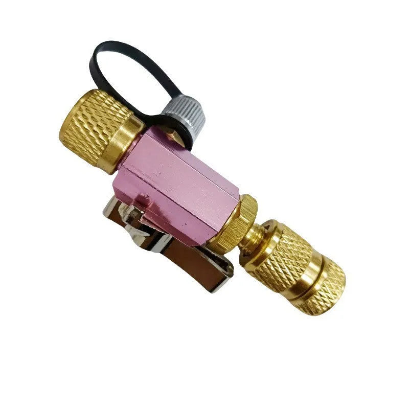 Bicycle valve core remover tools in black and pink showing 1/4 inch and 5/16 inch sizes